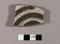 Sherd with figurative design (coiled centipede)