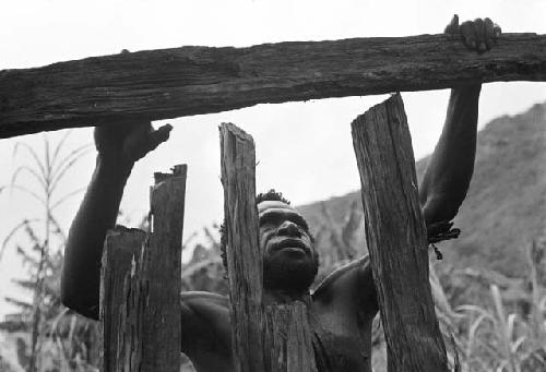 Itamugwi working on a structure in his sili