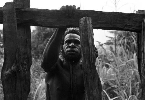 Itamugwi working on a structure in his sili