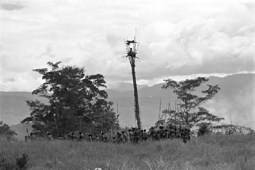 Men grouped under the kaio at Puakoloba