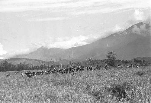 People on the Liberek dancing; southern valley rises in the background