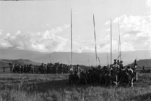 From the oléa towards the south; large group of men dancing in background