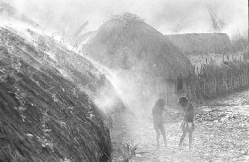 Children outside houses