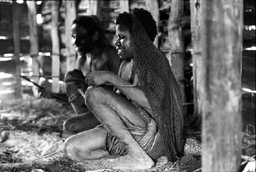 People sitting on straw