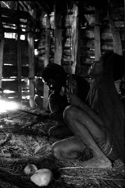 People sitting on straw