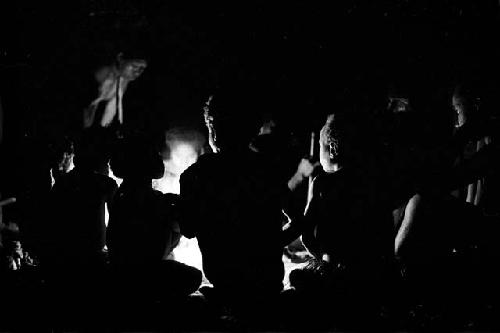 Group of kids in hunu at night