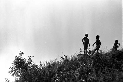 3 children playing in the ugulilu