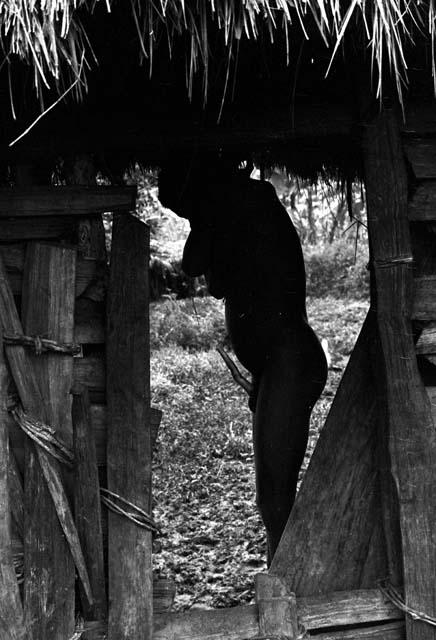 man stands in doorway of sili