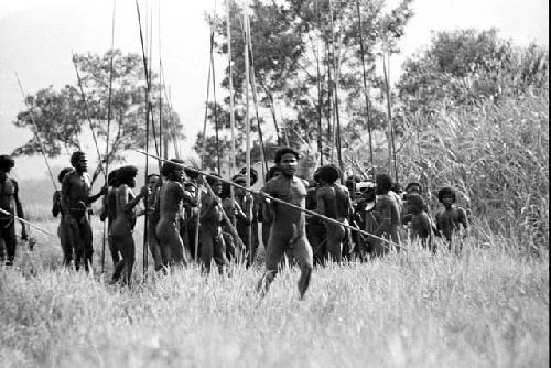 Men dancing towards the Liberek