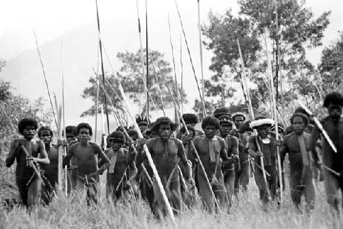 Men dancing towards the Liberek