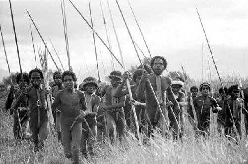 Men dancing towards the Liberek