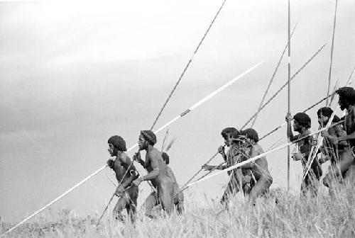 Men dancing towards the Liberek