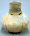 Medial shouldered jar; rounded base, narrow mouth, tall neck, restored; fairly l
