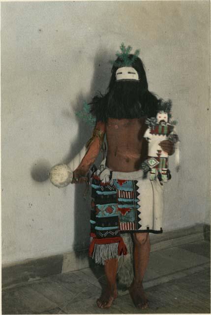 Ceremonial costume for dance with his Tihui in miniature