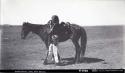Zuni scout and horse