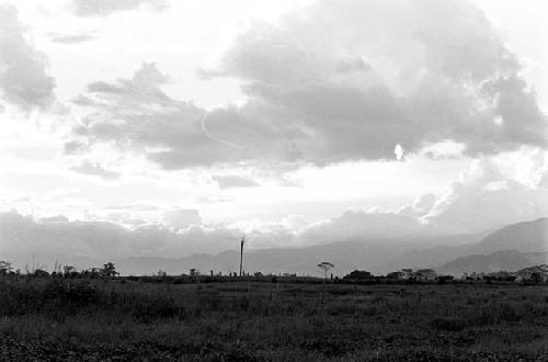 In the far distance a kaio in the late light; across the fields of Wululumo