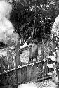 Young boy goes over the fence into the back sili of Abulupak to singe the mice