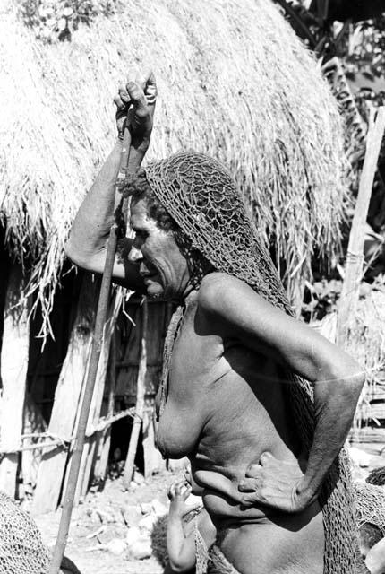 a female mourner in deep grief