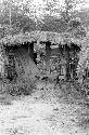 Boy coming into the sili thru the entryway of Abulupak