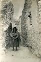 Hopi woman standing in the street in Sichumuavi