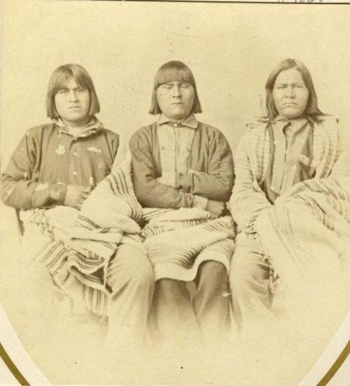 Three Hopi men from Hano seated