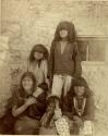 Hopi woman with two babies and three boys