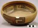 Shallow bowl, black on brown slip on tan, geometric design