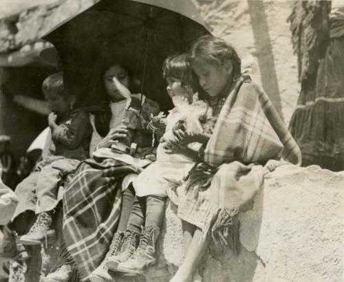 Niman Katcina ceremony at Walpi, Hopi children with dolls