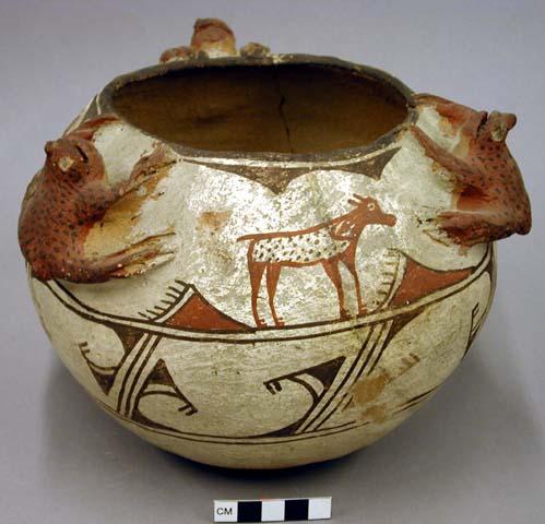 Pottery bowl with unusual decoration of modelled frogs