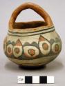 Pottery vessel with handle