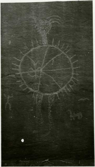 Carson's Wall petroglyph of human with decorated shield