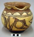 Jar, polacca polychrome style c. zuni rain bird design. 15.5 x 18.0 cm.