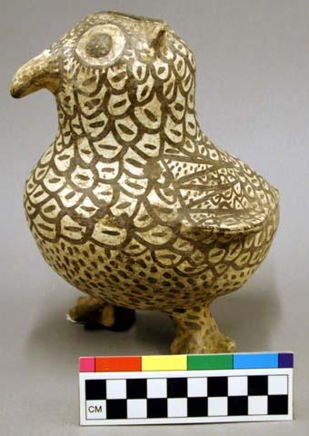 Brown on white pottery bird