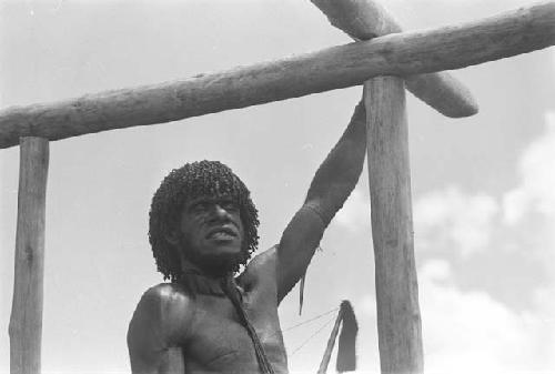 A Dani watches as the school is being built