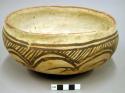 Bowl, polacca polychrome style c. int: splatter design; ext: zuni rain bird desi