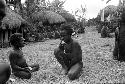 Tukom and Torop eating hiperi; sili beyond