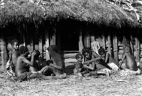 Children and women; against the hunu; one of the little girls who had her finger chopped off is there