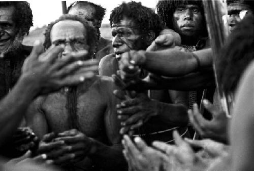 Men's hands cleaned by feather wand