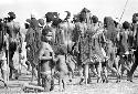 Women dancing on the Liberek; child nurses