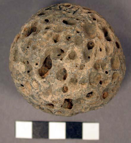 Stone ball. spherical cobble. ceremonial, game, or other use. vesicular basalt.