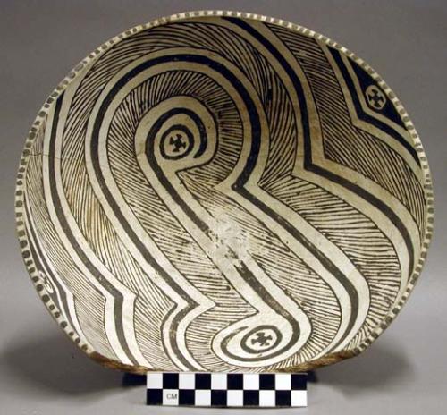 Black on white pottery bowl - broken