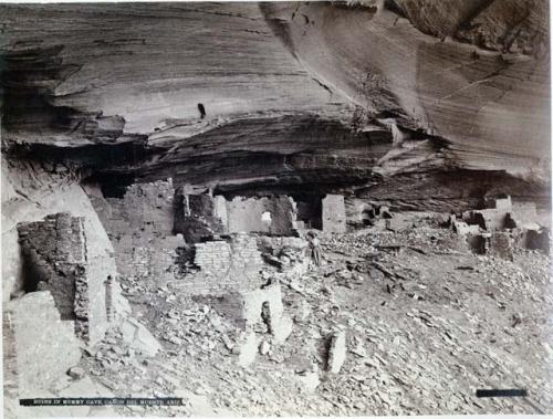 Man standing at ruins in Mummy Cave