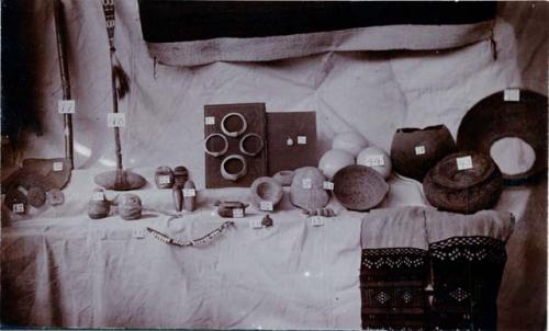 Studio shot of pottery and necklaces