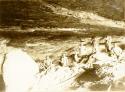 Seven men inside with shovels inside Kelley Cavern