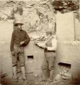 F.W. Putnam and F.E. Hyde Standing at the walls of an Estufa