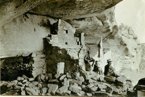 Ruins of Balcony House, three men pictured