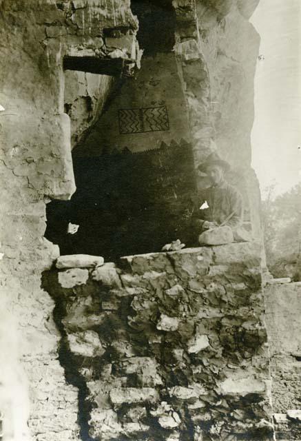 Paintings in Square tower of Cliff Palace ruins, man pictured by mural