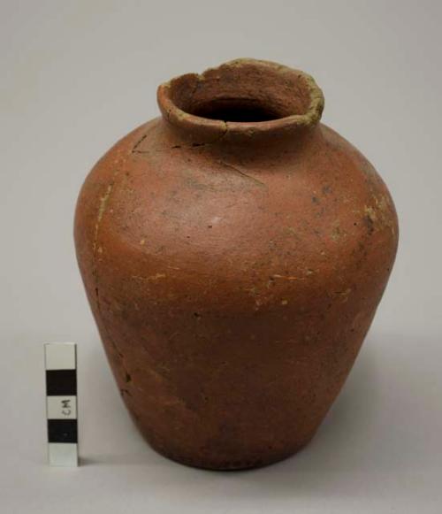 Red slipped plain brown ware jar