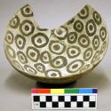 Ceramic vessel, rim missing large sherd, black and white interior design