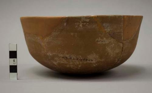 Restored plain red-brown ware bowl (Class C)